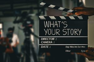 What's your story.text title on film slate and film crew in background